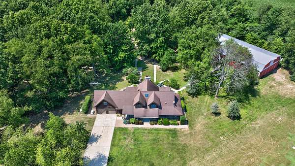 83.9 Acres of Land with Home for Sale in Horton, Michigan