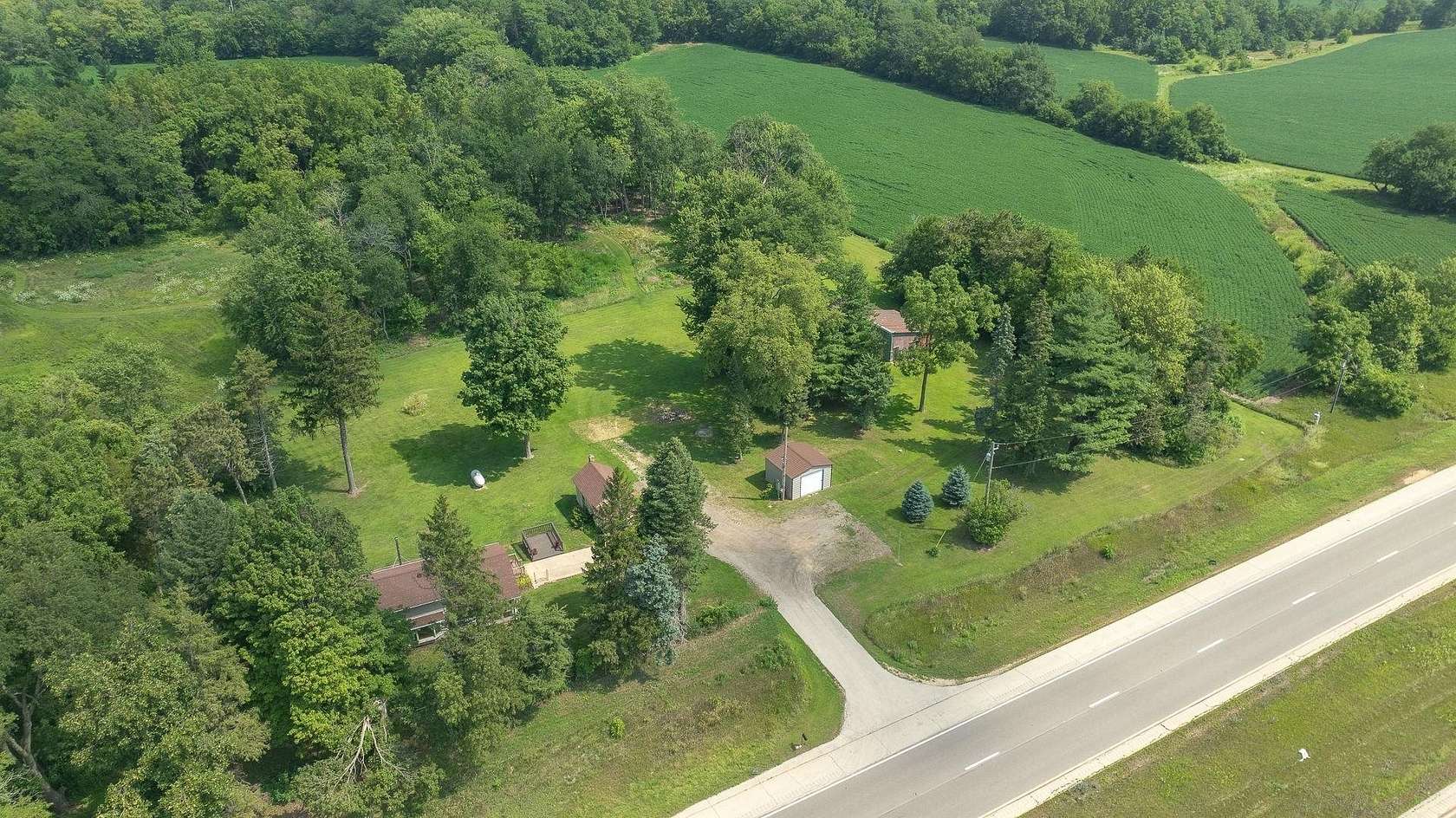 6.35 Acres of Land with Home for Sale in Pecatonica, Illinois