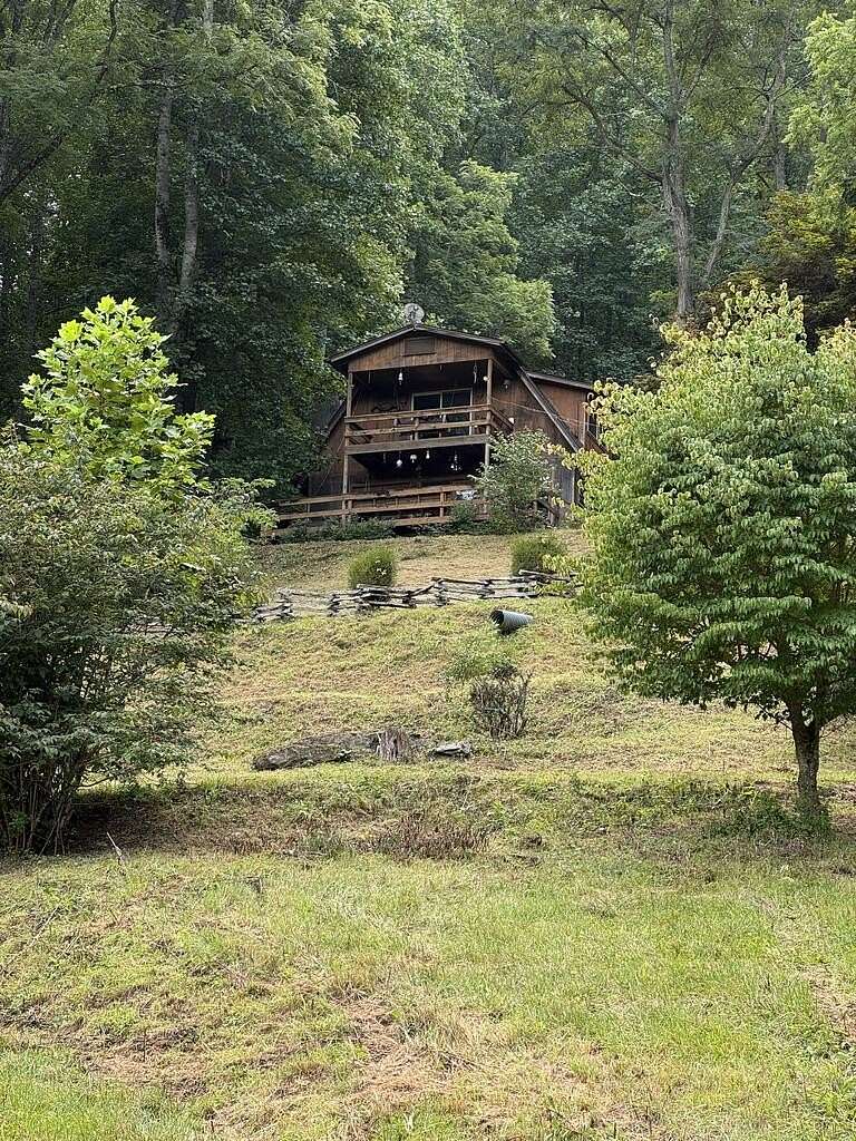 15.7 Acres of Land with Home for Sale in Cullowhee, North Carolina