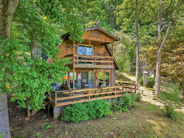 15.7 Acres of Land with Home for Sale in Cullowhee, North Carolina