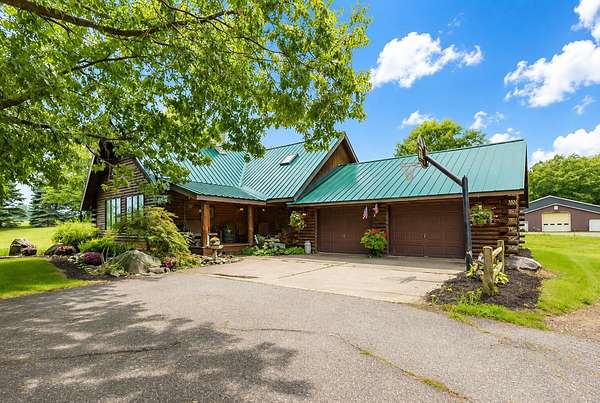27 Acres of Land with Home for Sale in Hopkins, Michigan
