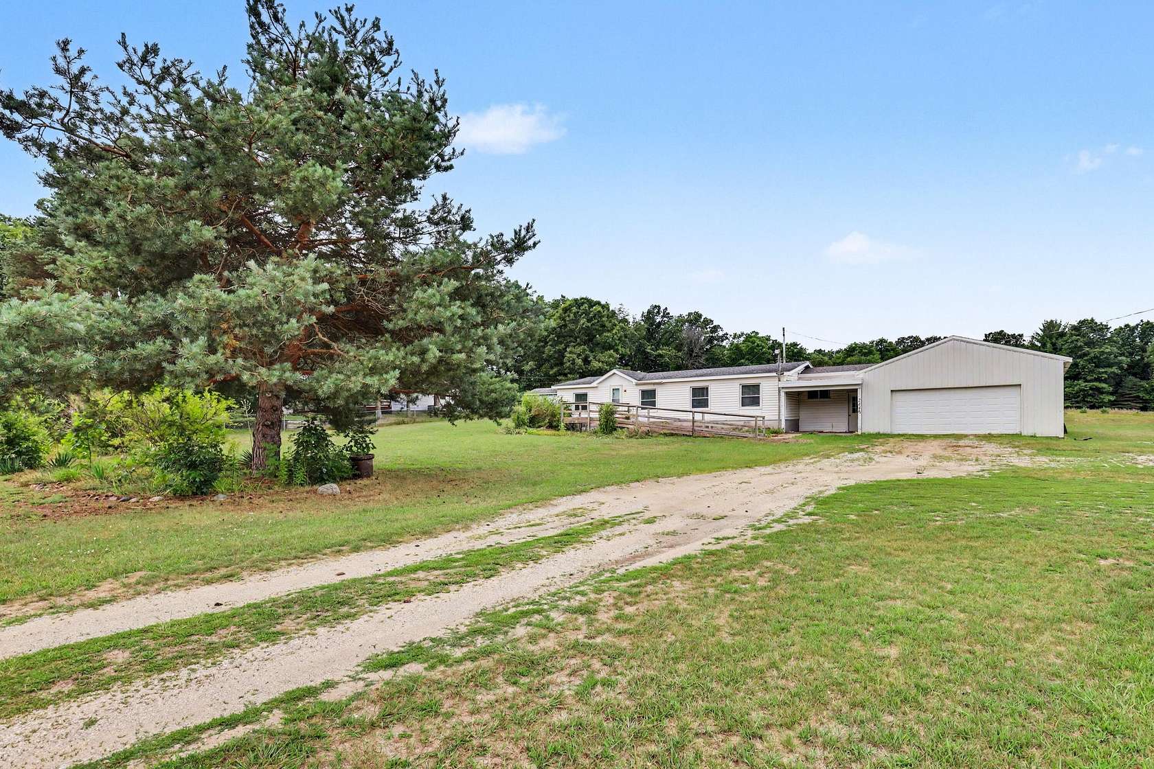 3 Acres of Land with Home for Sale in Greenville, Michigan
