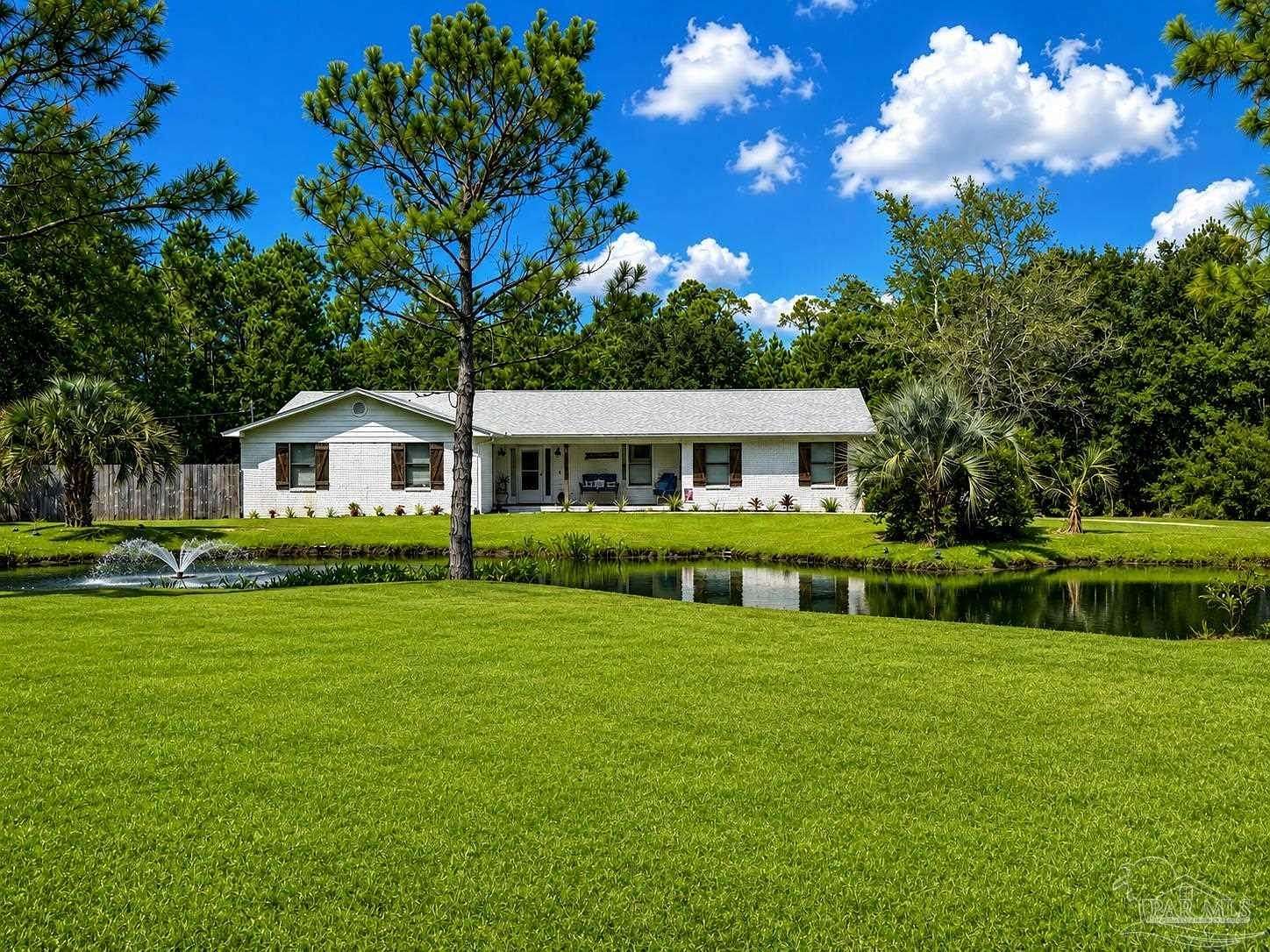 1.67 Acres of Land with Home for Sale in Milton, Florida