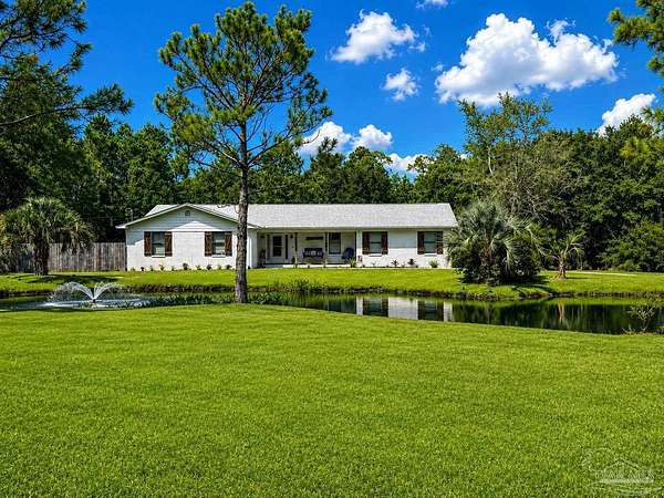 1.67 Acres of Land with Home for Sale in Milton, Florida
