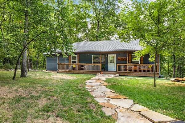 7.3 Acres of Land with Home for Sale in Marble Falls Township, Arkansas