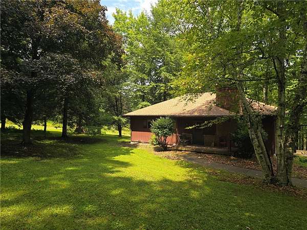 10 Acres of Land with Home for Sale in Evans City, Pennsylvania
