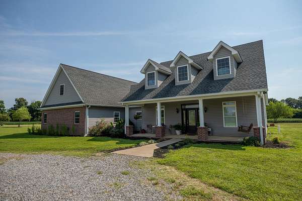 51.7 Acres of Land with Home for Sale in Kirksey, Kentucky