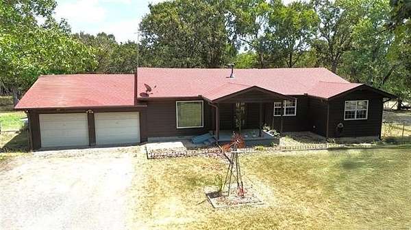 8 Acres of Land with Home for Sale in Tahlequah, Oklahoma