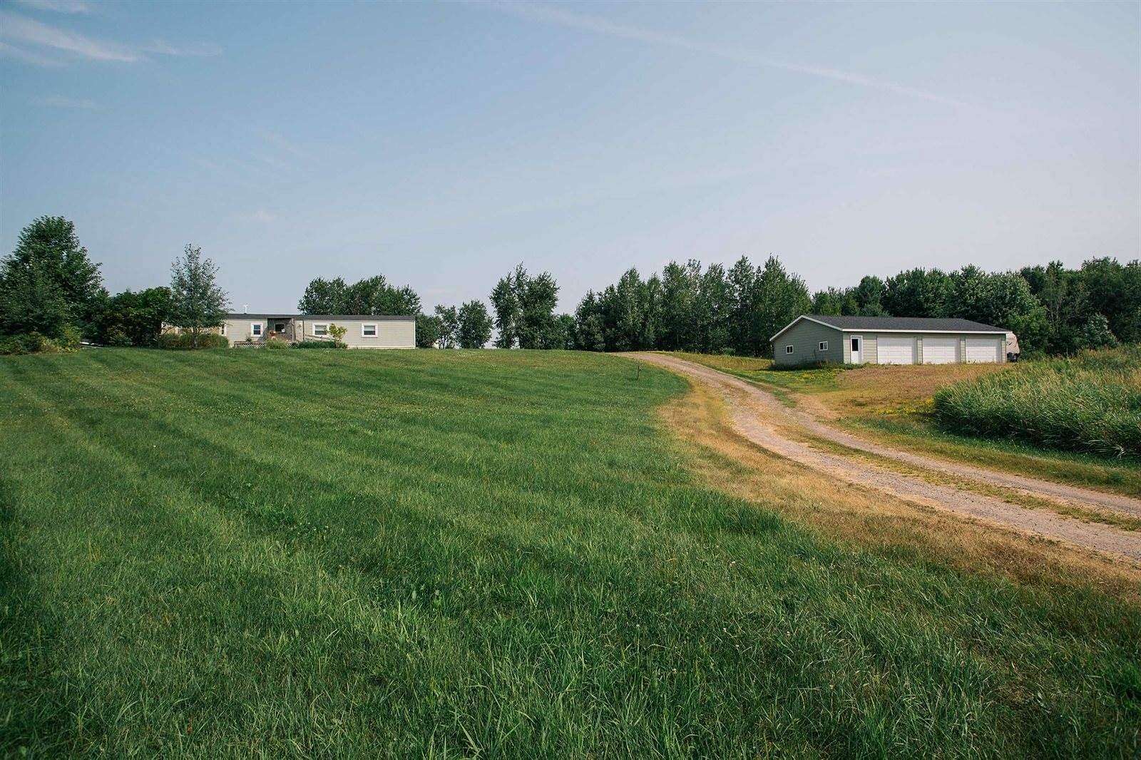 20.1 Acres of Recreational Land with Home for Sale in Lublin, Wisconsin