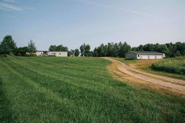 20.1 Acres of Recreational Land with Home for Sale in Lublin, Wisconsin