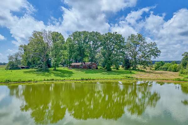 25 Acres of Land with Home for Sale in Kinards, South Carolina