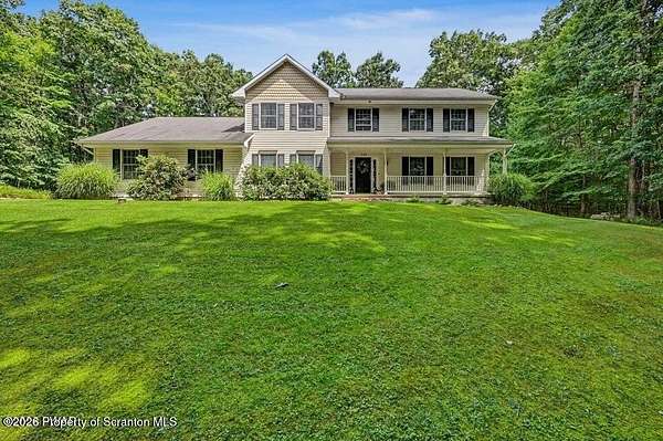 4 Acres of Land with Home for Sale in Roaring Brook Township, Pennsylvania