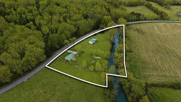 3.79 Acres of Land with Home for Sale in Pelham, Tennessee