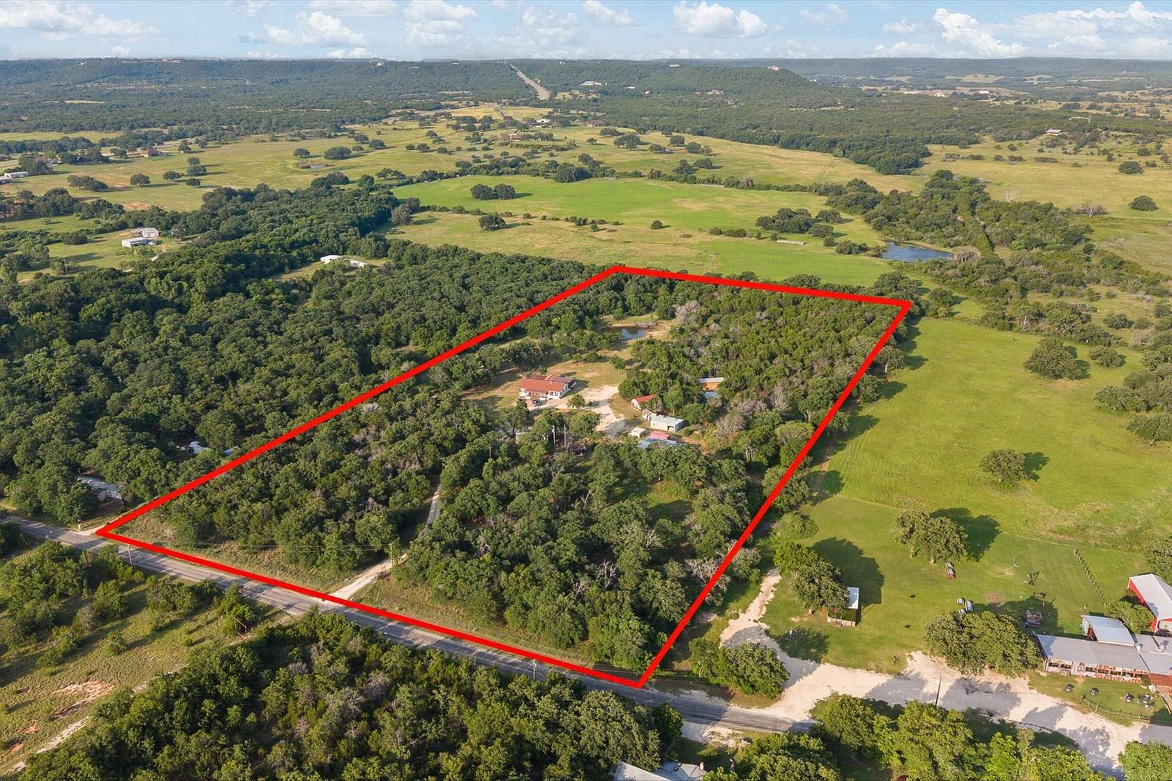 13.6 Acres of Recreational Land with Home for Sale in Glen Rose, Texas