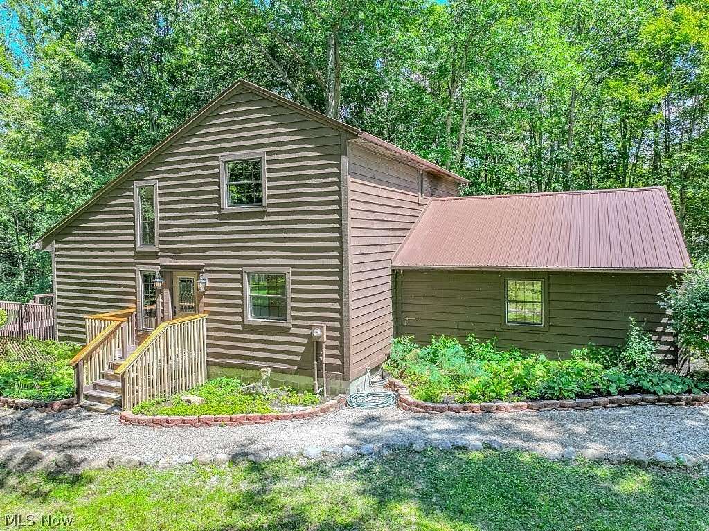 10.3 Acres of Recreational Land with Home for Sale in Concord Township, Ohio