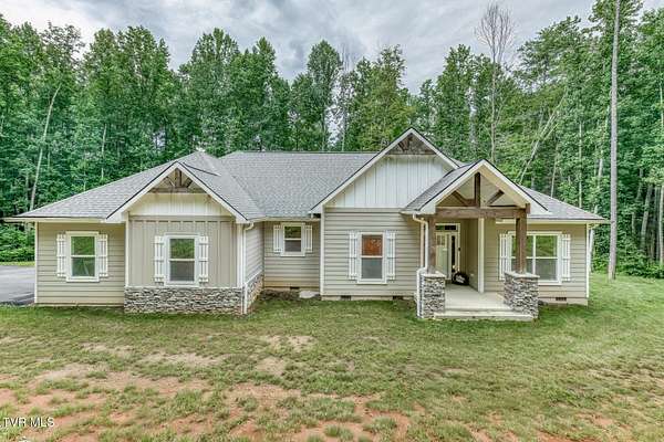 5.65 Acres of Land with Home for Sale in Erwin, Tennessee