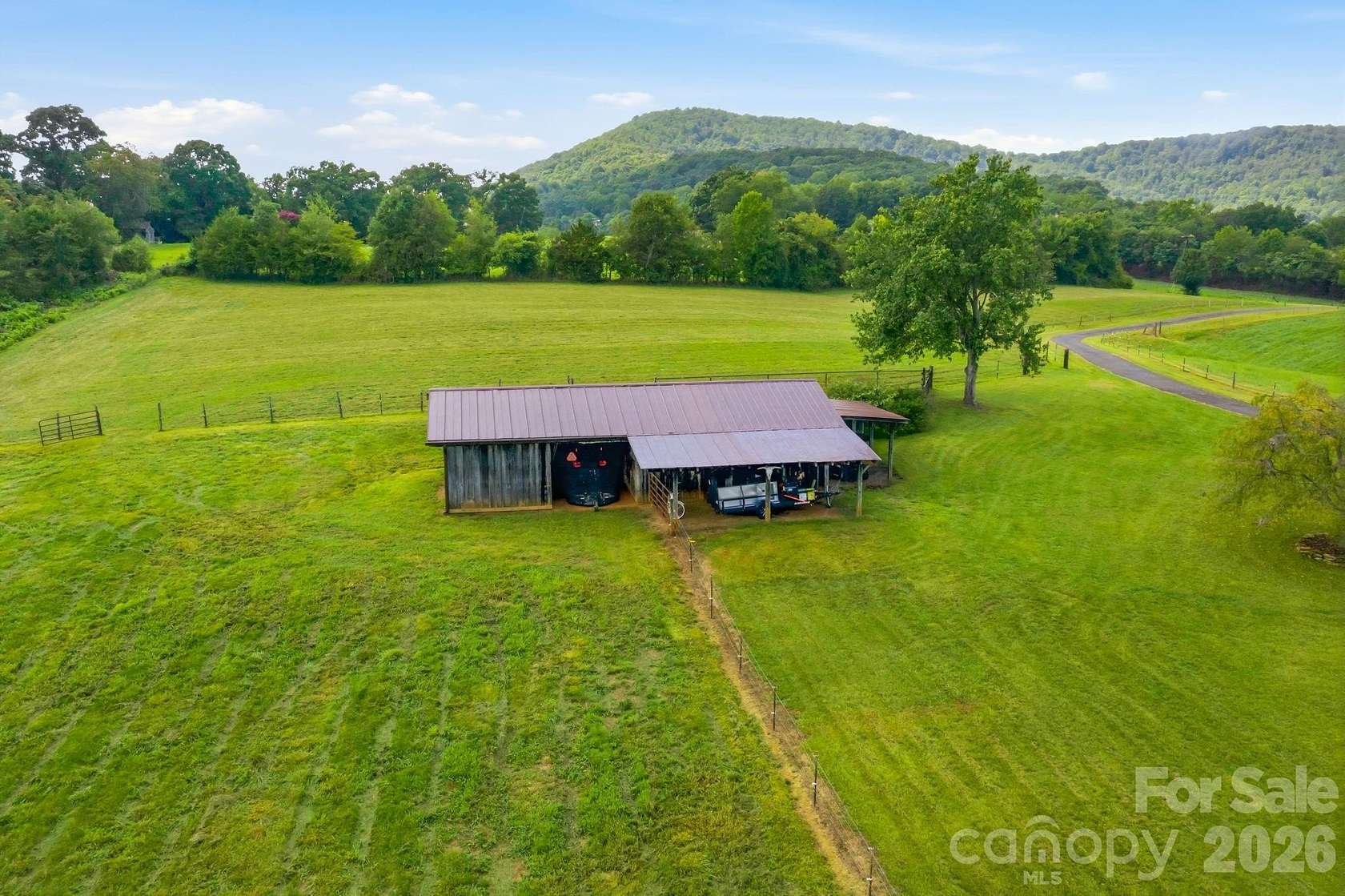 20.6 Acres of Land with Home for Sale in Hiddenite, North Carolina