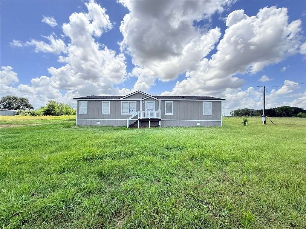 1.59 Acres of Land with Home for Sale in Ganado, Texas