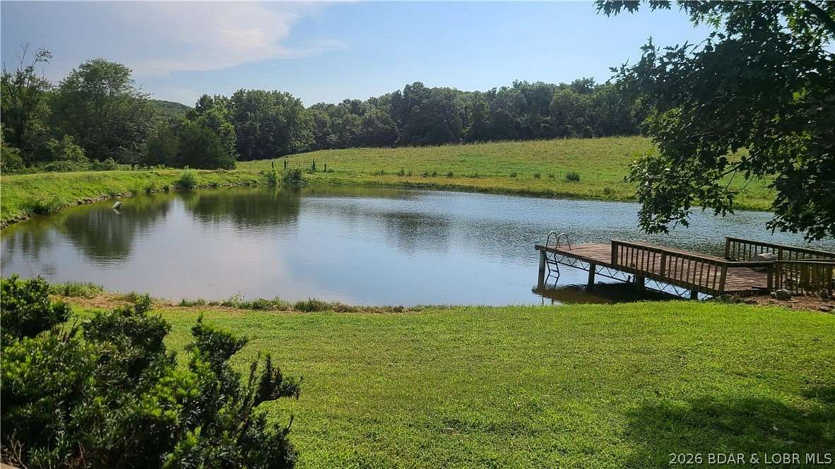 313 Acres of Recreational Land with Home for Sale in Versailles, Missouri