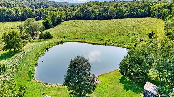 310 Acres of Recreational Land with Home for Sale in Versailles, Missouri