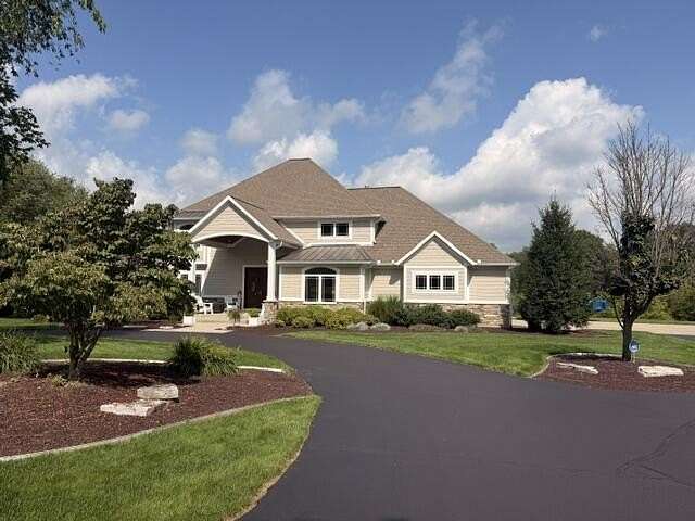 7 Acres of Land with Home for Sale in Ada, Michigan
