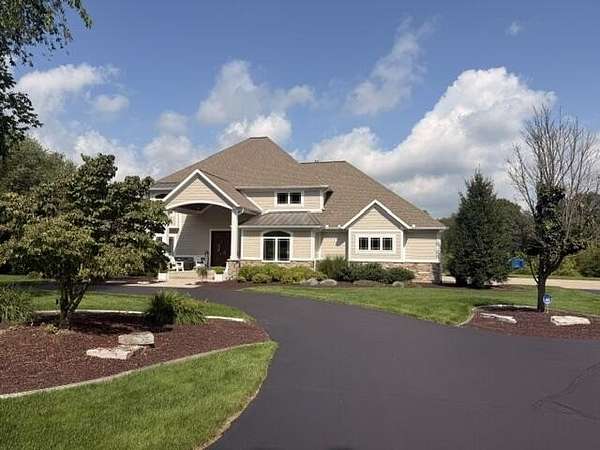 7 Acres of Land with Home for Sale in Ada, Michigan