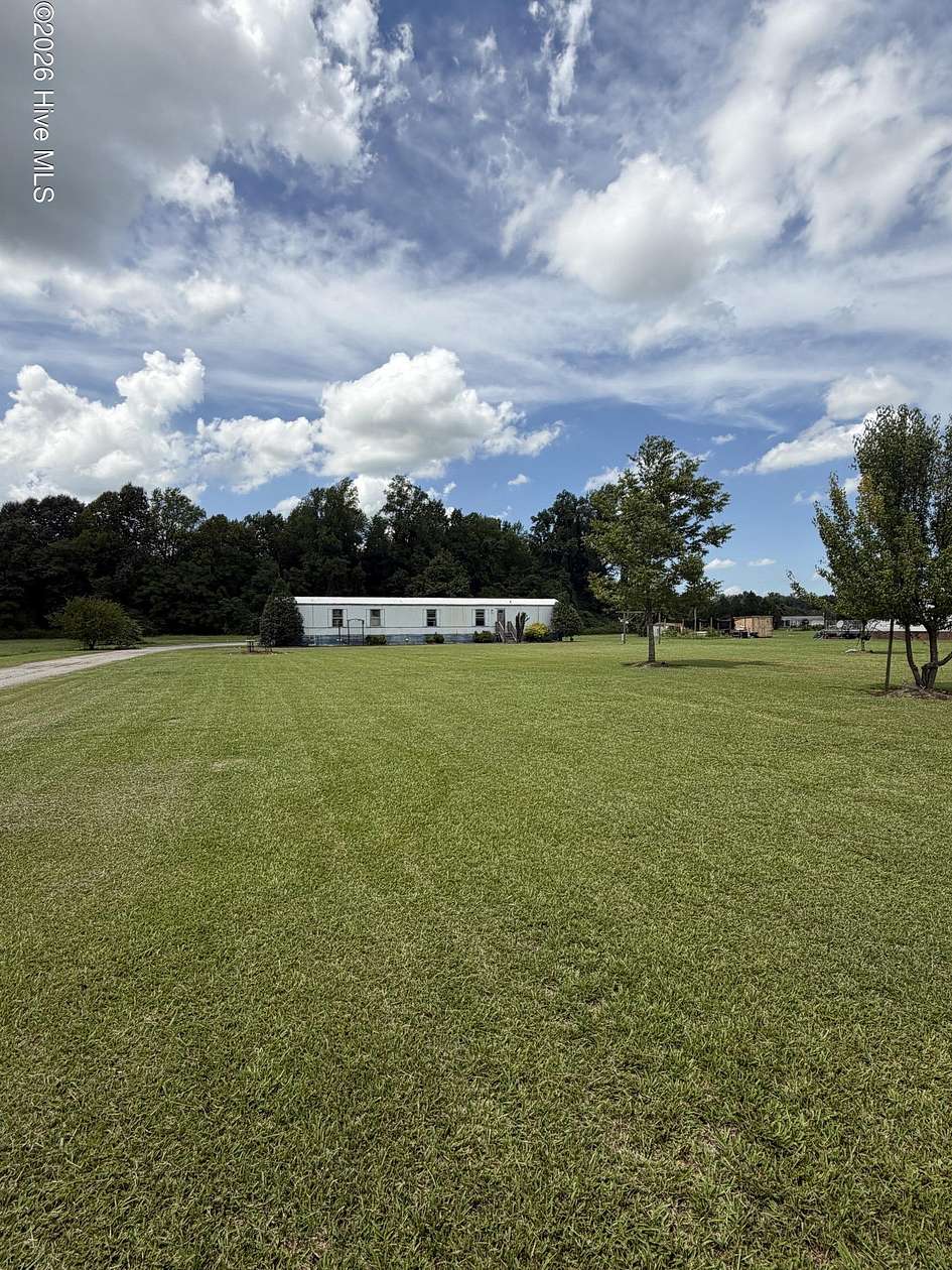 1.5 Acres of Land with Home for Sale in Grimesland, North Carolina