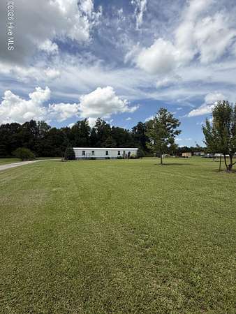 1.5 Acres of Land with Home for Sale in Grimesland, North Carolina