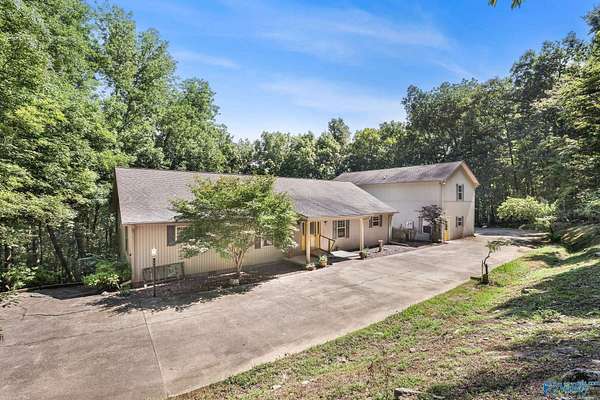 10.3 Acres of Land with Home for Sale in Owens Cross Roads, Alabama