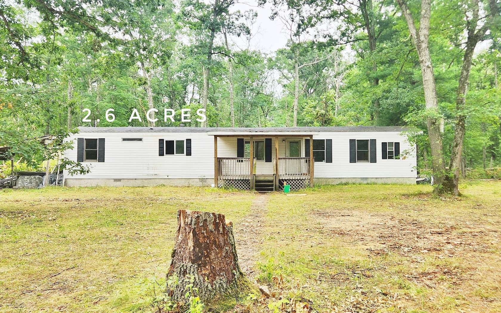 6 Acres of Land with Home for Sale in Bitely, Michigan