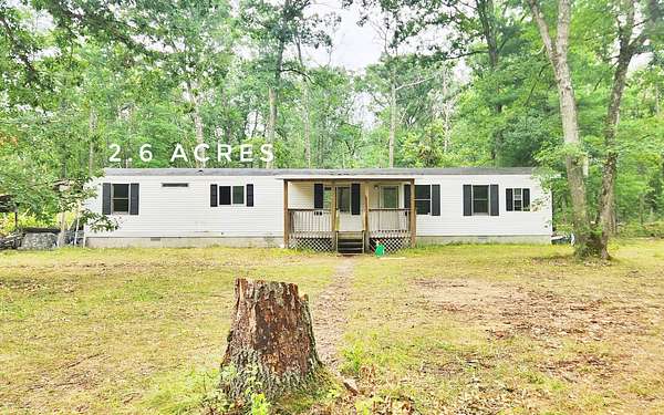 6 Acres of Land with Home for Sale in Bitely, Michigan