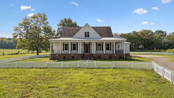 5 Acres of Land with Home for Sale in Castalian Springs, Tennessee
