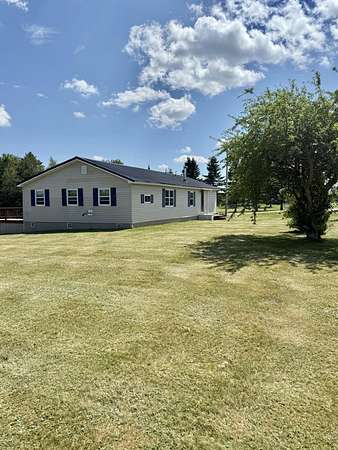 3 Acres of Land with Home for Sale in Caswell Town, Maine