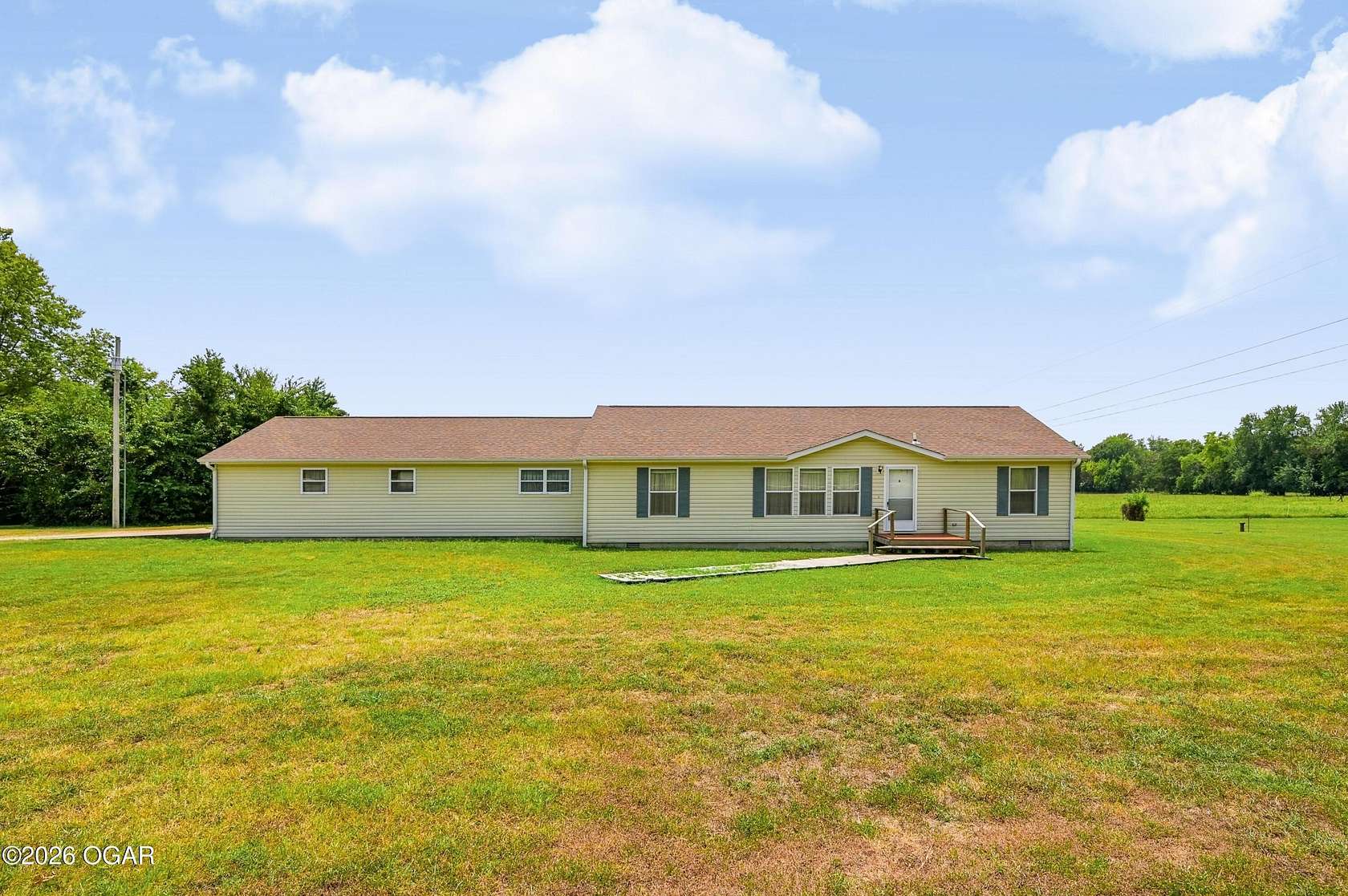 1.75 Acres of Land with Home for Sale in Carthage, Missouri