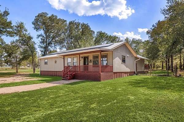 6.84 Acres of Land with Home for Sale in Lockhart, Texas