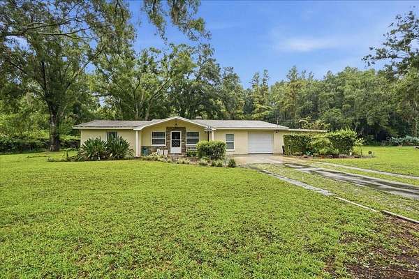 2.63 Acres of Land with Home for Sale in Tarpon Springs, Florida