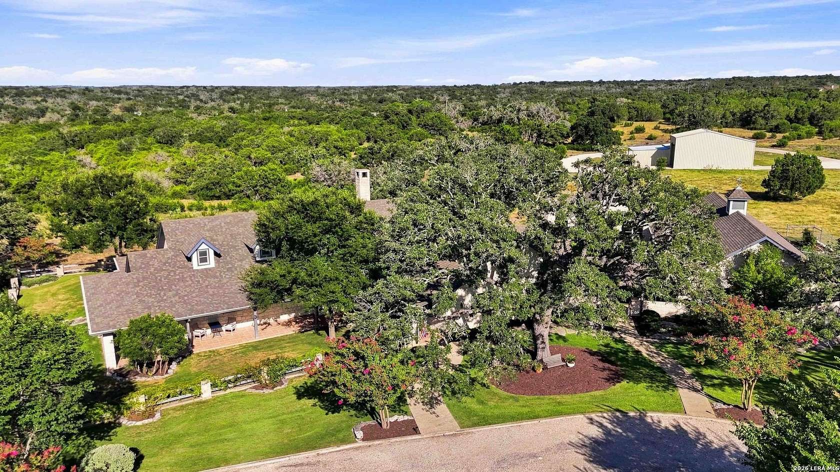 23.6 Acres of Agricultural Land with Home for Sale in Kerrville, Texas