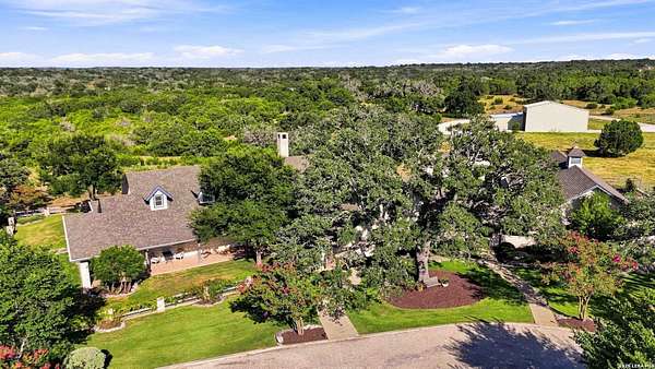 23.6 Acres of Agricultural Land with Home for Sale in Kerrville, Texas