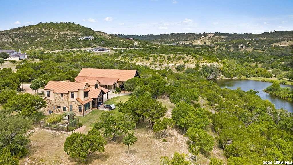 5.53 Acres of Land with Home for Sale in Blanco, Texas