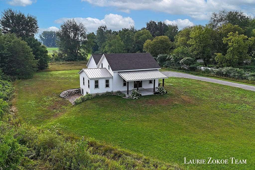 2 Acres of Land with Home for Sale in Coopersville, Michigan
