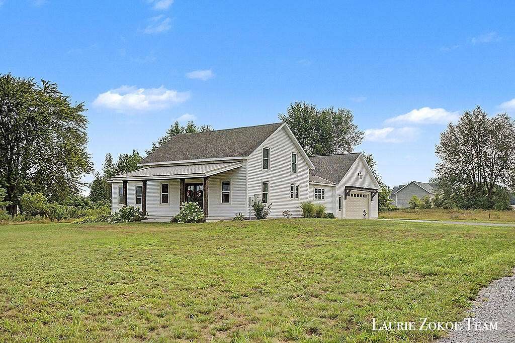 2 Acres of Land with Home for Sale in Coopersville, Michigan
