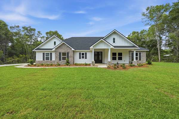 3.5 Acres of Land with Home for Sale in Holt, Florida