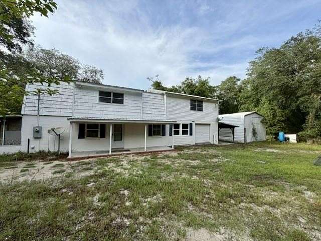 21 Acres of Recreational Land with Home for Sale in Branford, Florida