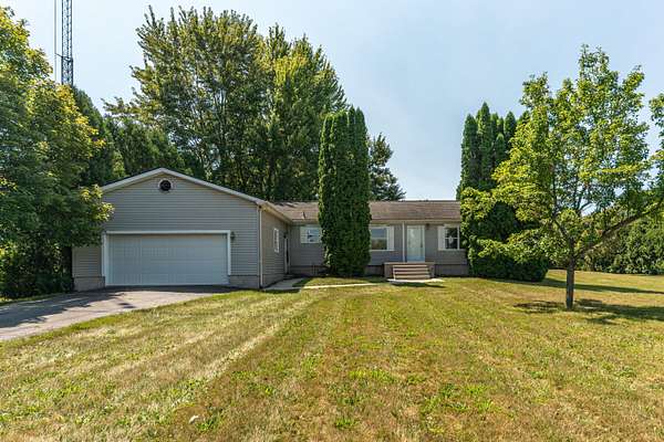 1.63 Acres of Land with Home for Sale in Milan, Michigan