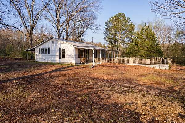 9 Acres of Land with Home for Auction in Florence, Alabama