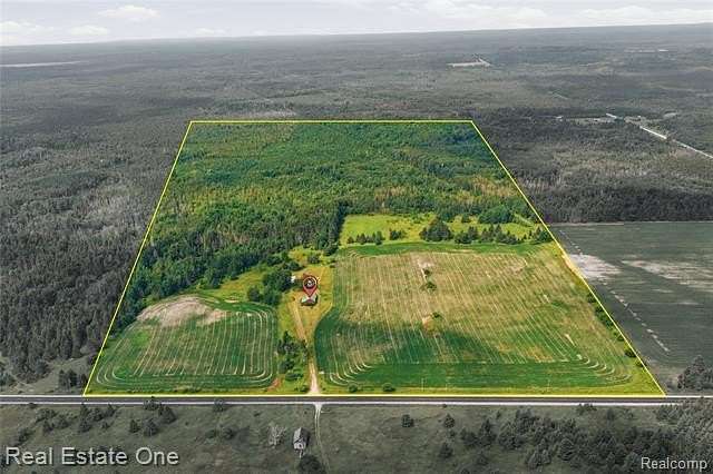 120 Acres of Land with Home for Sale in Doyle Township, Michigan