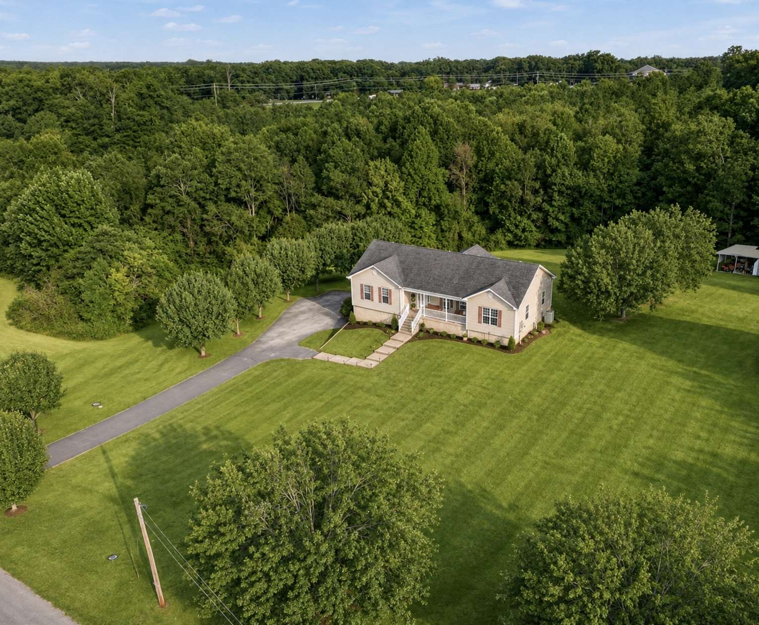 1.65 Acres of Land with Home for Sale in Centerville, Tennessee