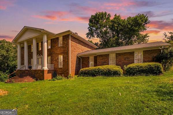 12 Acres of Land with Home for Sale in Bowdon, Georgia