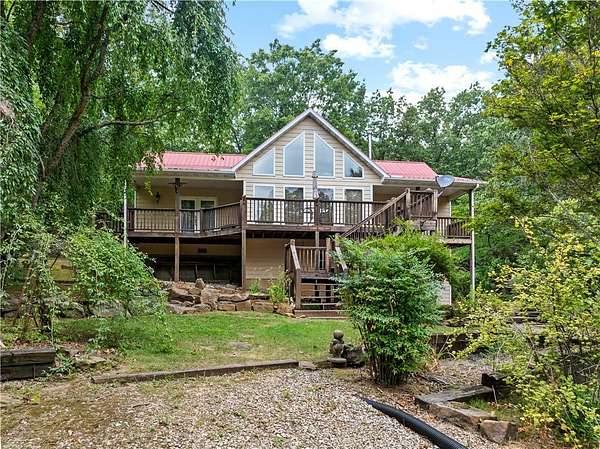 26.2 Acres of Recreational Land with Home for Auction in Alpena, Arkansas