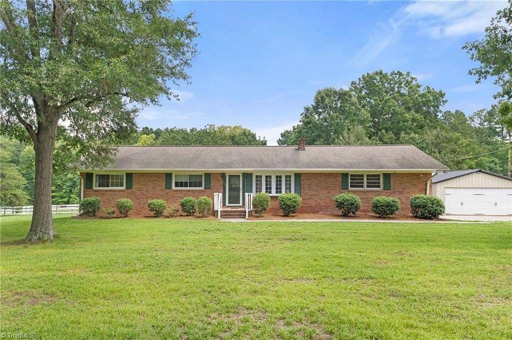 3.2 Acres of Land with Home for Sale in Gibsonville, North Carolina